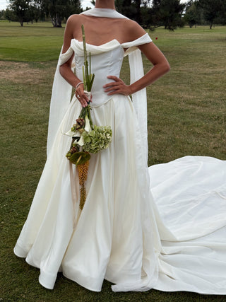 Wedding set with a lace-up corset with dropped sleeves made of chiffon and a fluffy A-line skirt with a long train and a loop for the arms