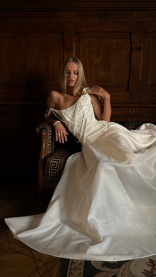 Set with a corset and skirt decorated with pearls — corset with an asymmetrical neckline, A-line skirt with a train