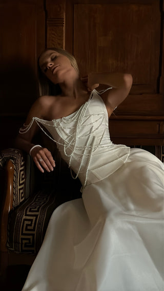 Set with a corset and skirt decorated with pearls — corset with an asymmetrical neckline, A-line skirt with a train