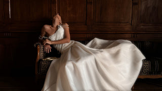 Set with a corset and skirt decorated with pearls — corset with an asymmetrical neckline, A-line skirt with a train