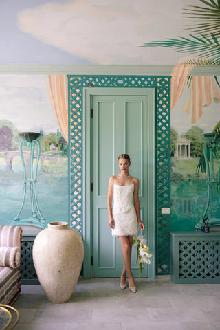 Lace wedding set with embroidered corset and two skirts: a long A-line skirt and a short lined skirt, with lace gloves