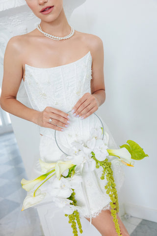 Lace wedding set with embroidered corset and two skirts: a long A-line skirt and a short lined skirt, with lace gloves