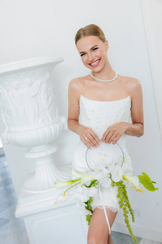 Lace wedding set with embroidered corset and two skirts: a long A-line skirt and a short lined skirt, with lace gloves