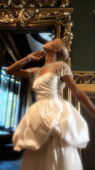 Set with a corset and two pleated skirts — a short fluffy one and a long straight one