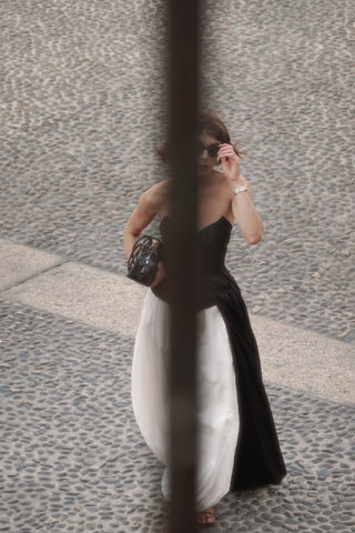 Black corset with draping and long train