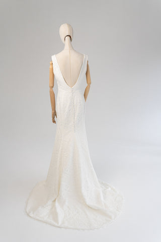 Original product photo — Ivory Lace Wedding Dress with V-Neckline & Slit