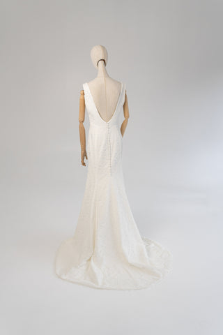 Original product photo — Ivory Lace Wedding Dress with V-Neckline & Slit
