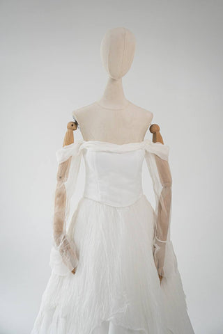 Original silk bridal set on mannequin — corset, skirt and detachable sleeves